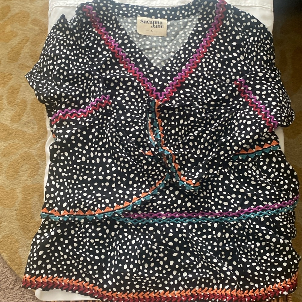 Polka dot peplum stitched top